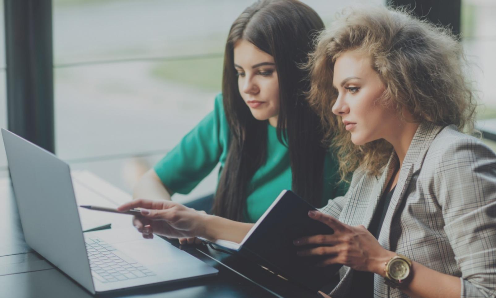 Financial planning consultation showing charts and personal discussion