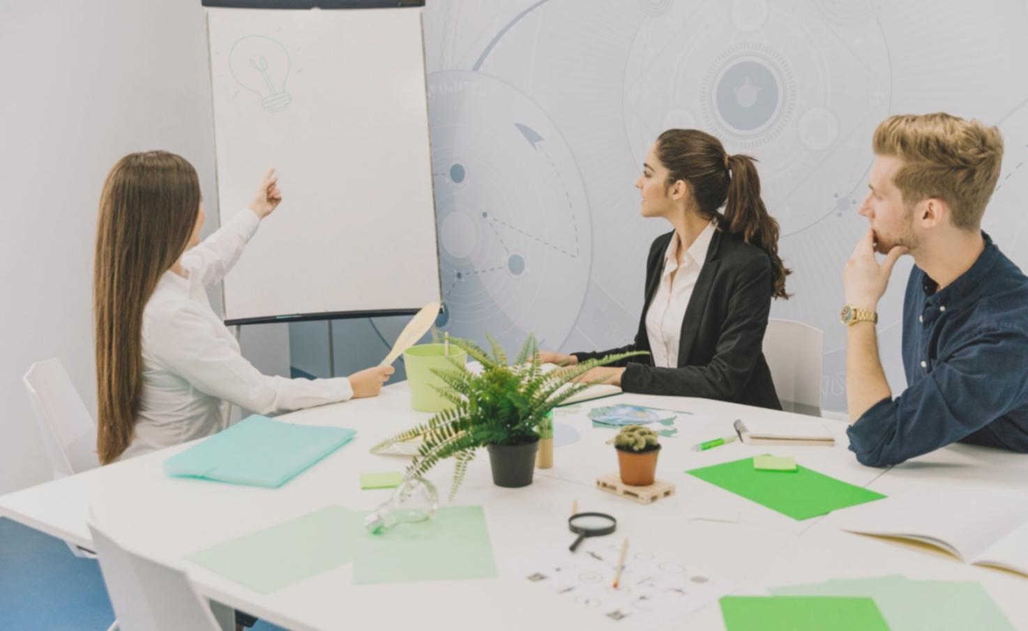 Professional financial advisor reviewing investment portfolios with client documentation